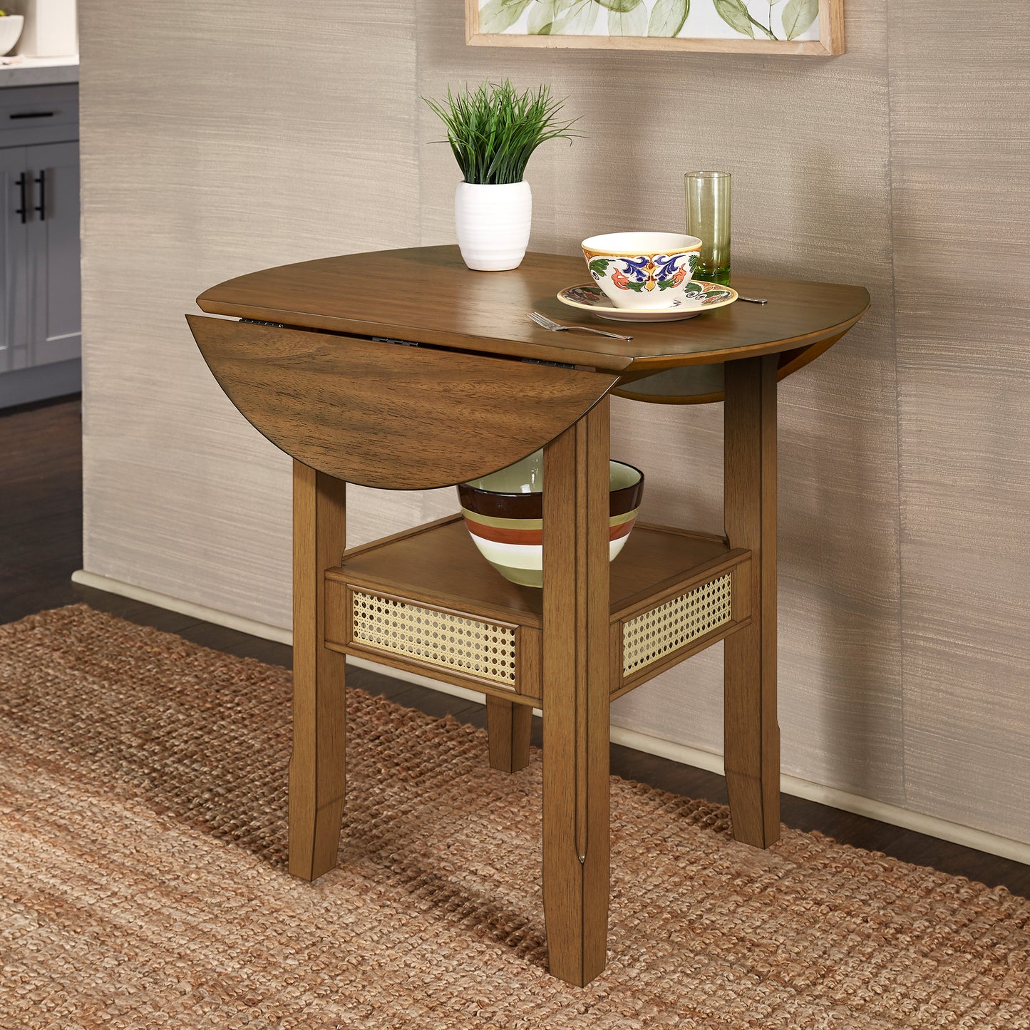 Cane Accent Dining - Round Top Table with 2-Drop Leaves, Oak Finish